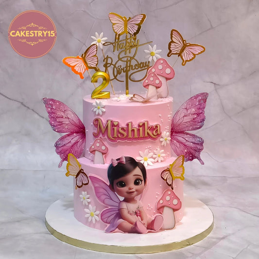 Butterfly Fairy kids birthday cake with butterfly wings, mushrooms and flowers, handcrafted as a theme cake Noida using premium eggless cakes.