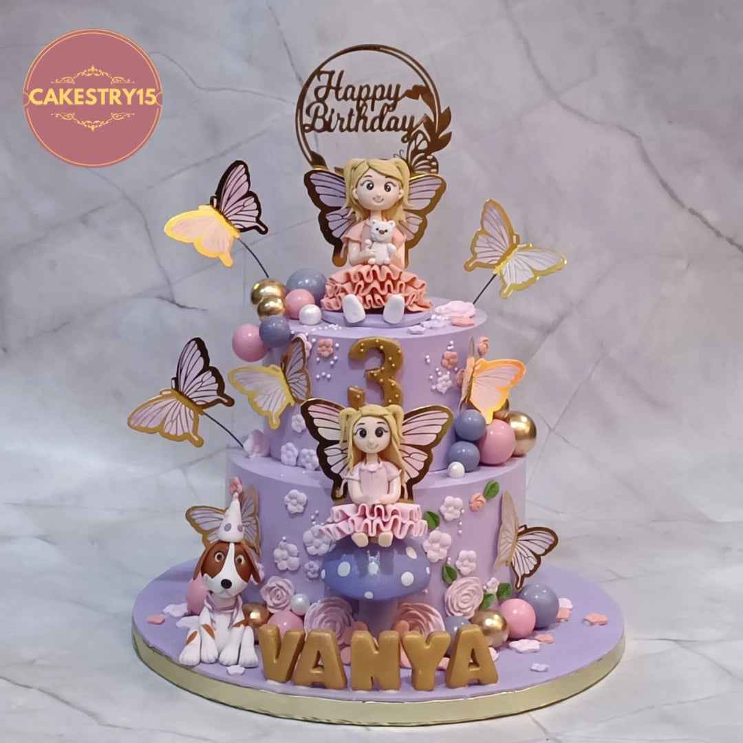 Butterfly garden kids birthday cake with girl figurines, beagle and butterflies, a premium theme cake Noida design from Cakestry15 featuring fresh eggless cakes.
