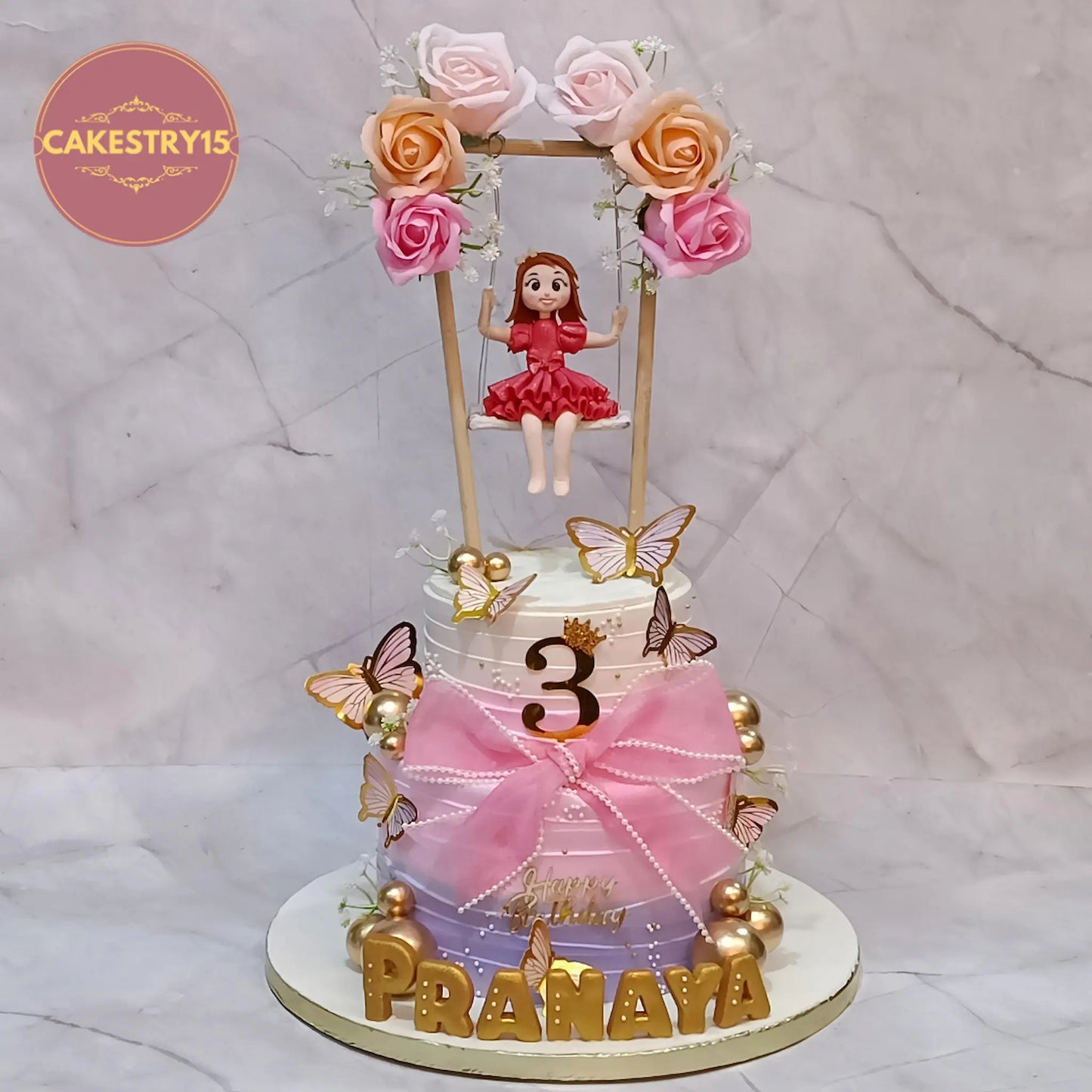 Butterfly theme 3rd birthday cake eggless kids birthday cake in Noida with swing topper, faux roses and pink bow design
