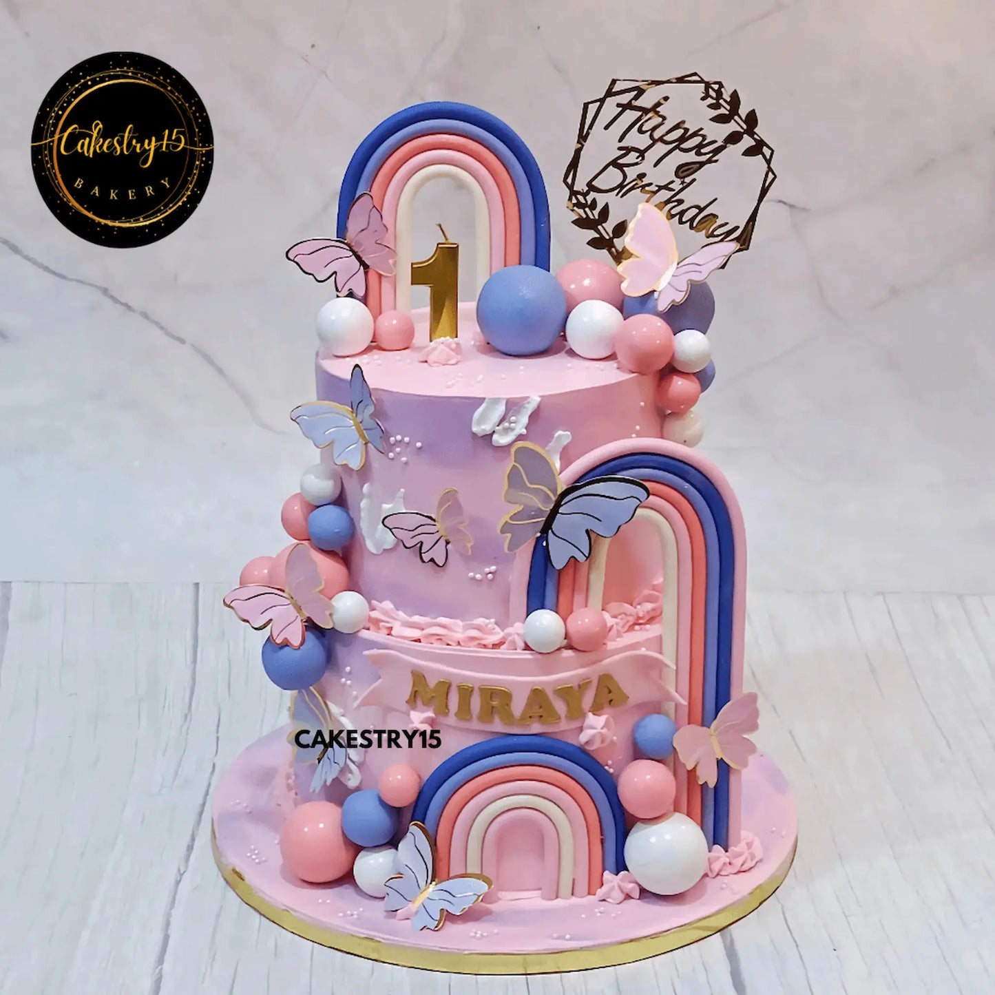 Butterfly theme kids birthday cake in Noida with rainbows and pastel design, premium eggless cakes for first birthday celebrations