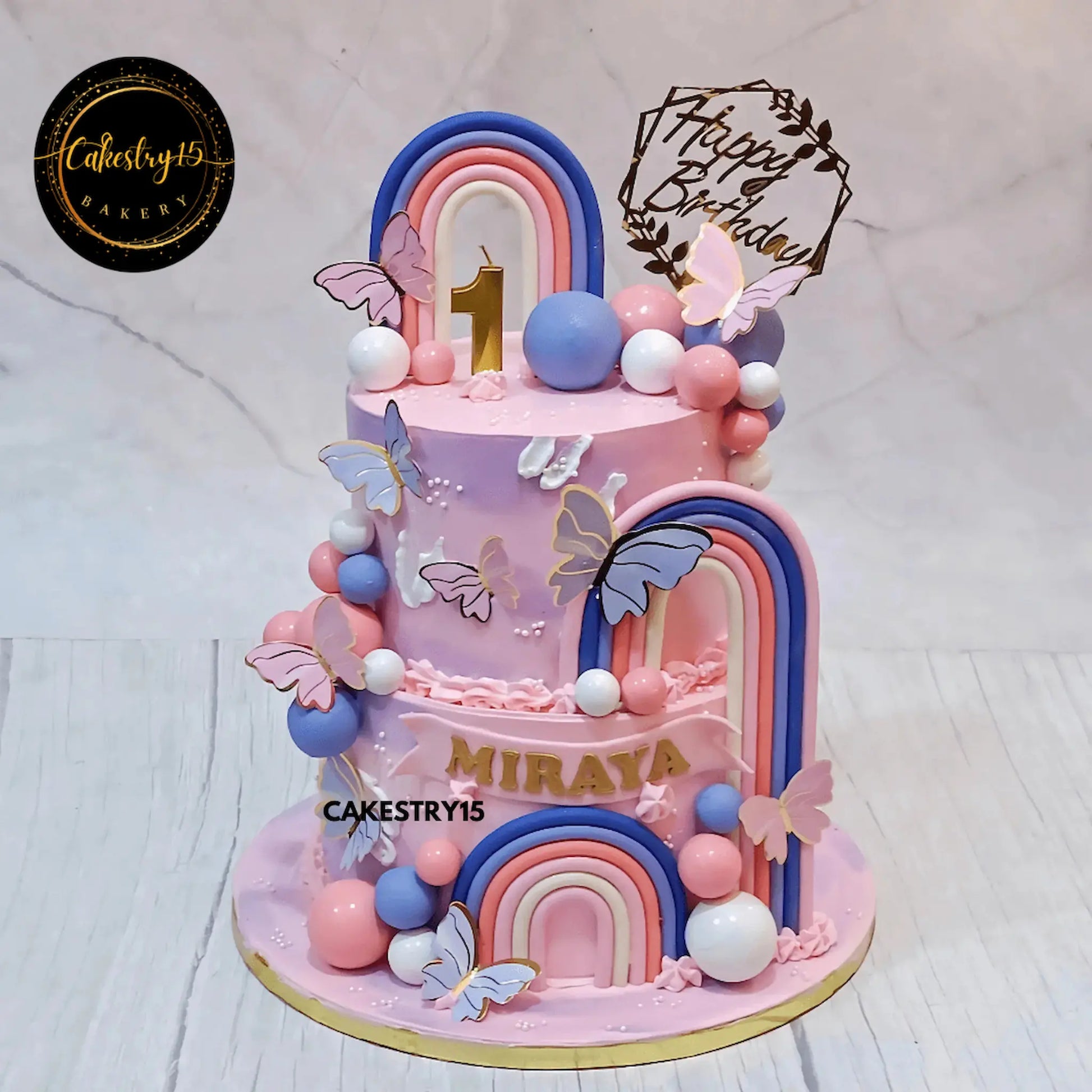 Butterfly theme kids birthday cake in Noida with rainbows and pastel design, premium eggless cakes for first birthday celebrations