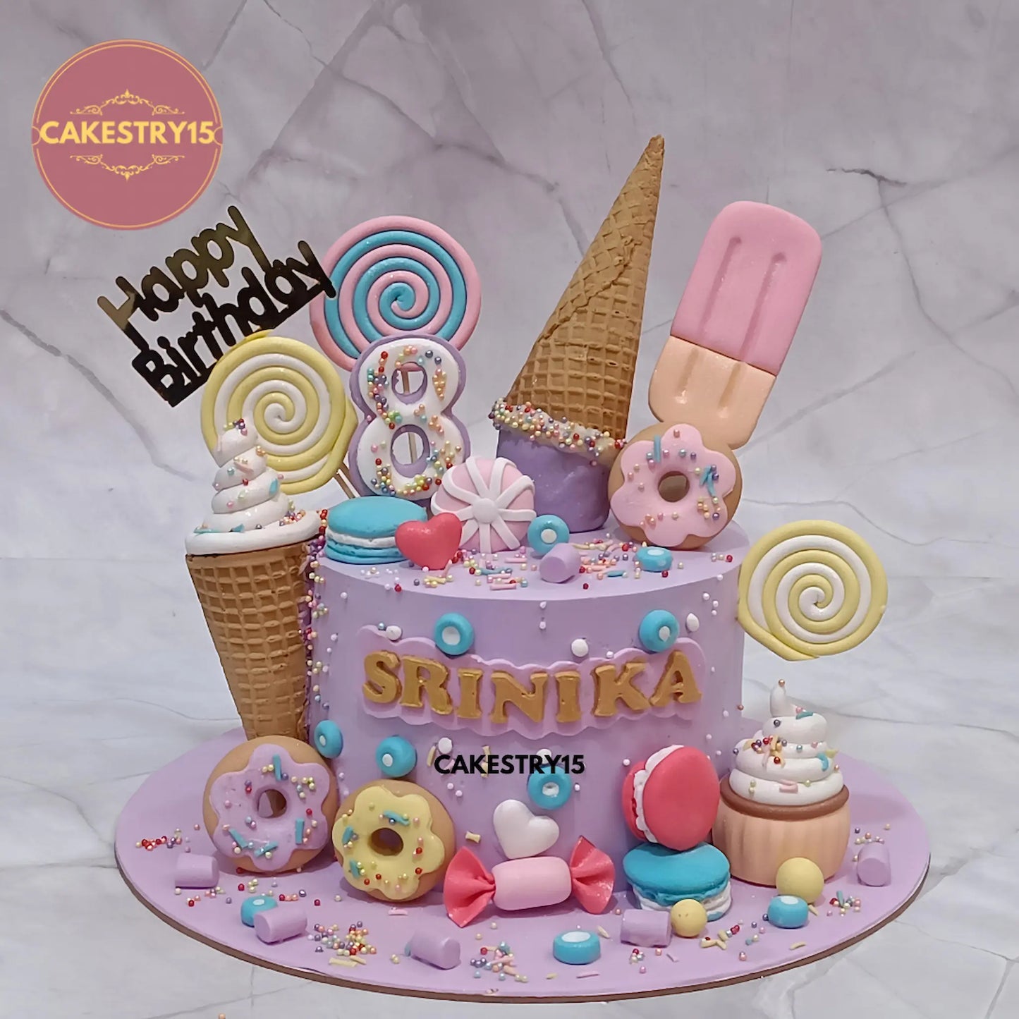 Eggless Candyland theme chocolate birthday cake for kids with colourful candy decorations in Noida by Cakestry15