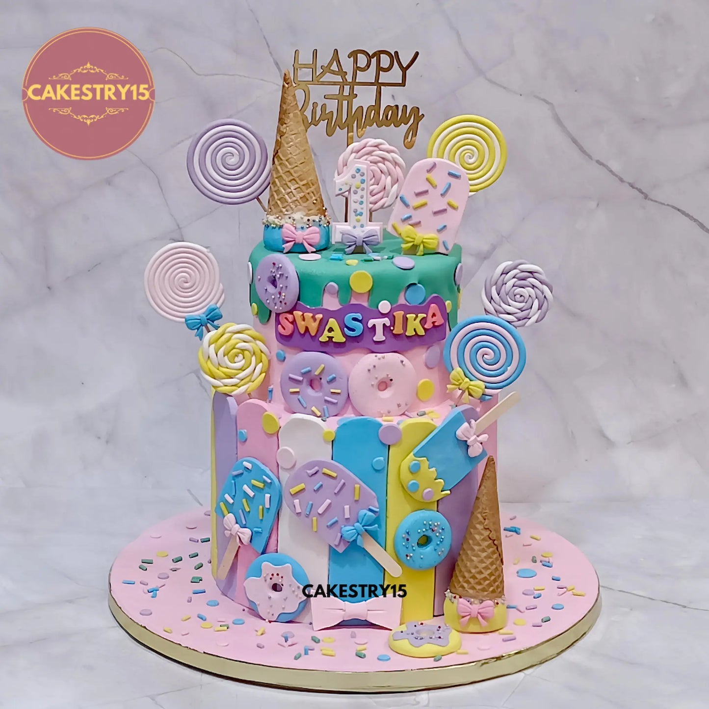 Candyland kids birthday cake theme cake Noida with chocolate flavour, premium eggless cakes design for first birthday