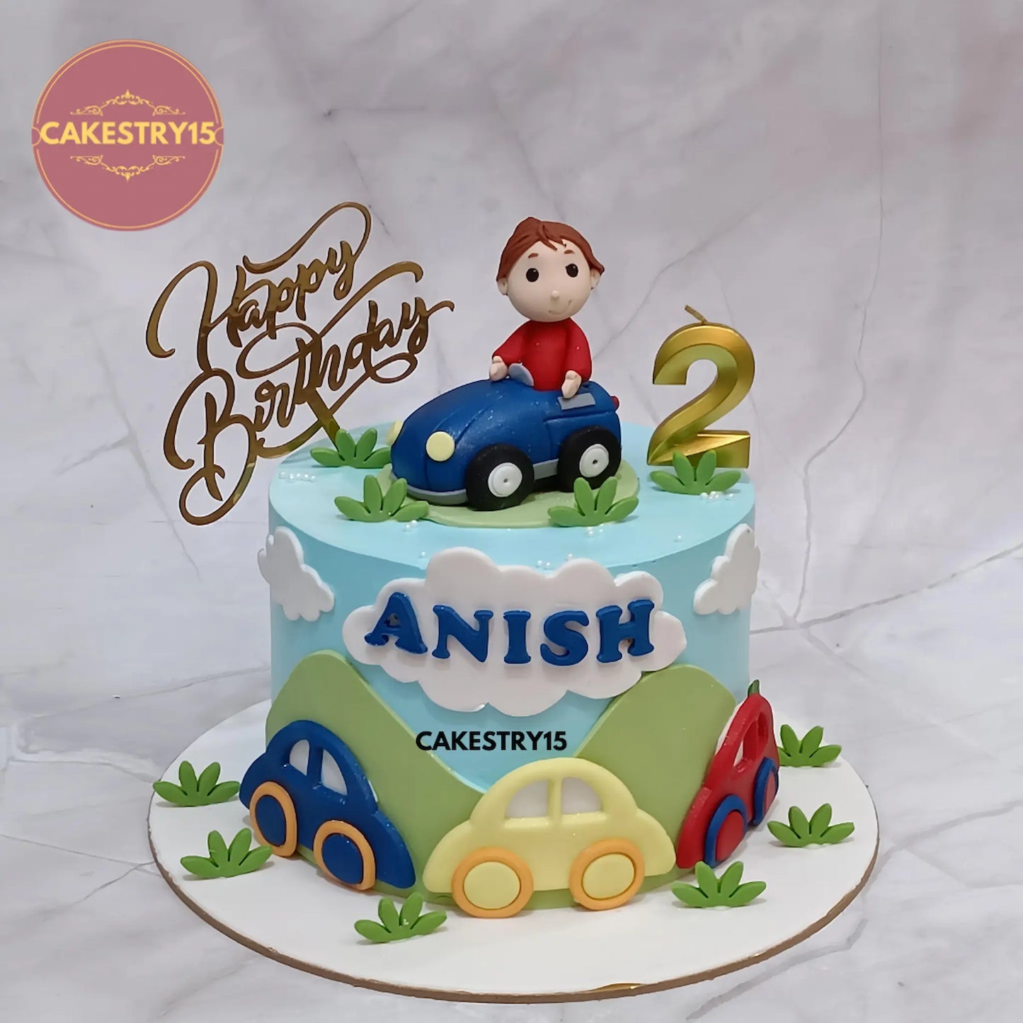 Eggless car theme 2nd birthday cake for kids in chocolate flavour, custom-made by Cakestry15 in Noida