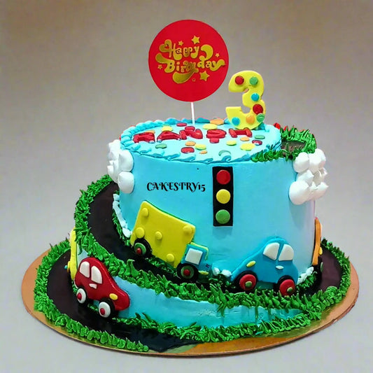 Eggless car theme 3rd birthday cake for kids with road design, cars and trucks, made by Cakestry15 in Noida