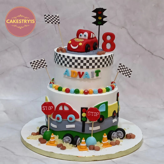 Car theme 8th birthday cake eggless kids birthday cake in Noida with racing cars, fondant roads and colourful decorations