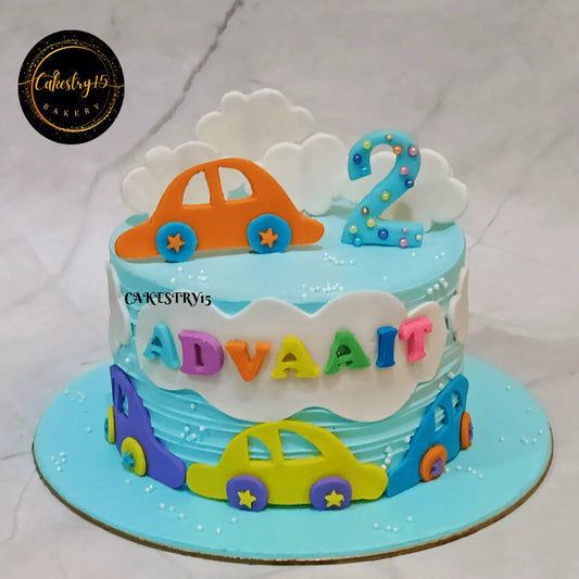 Eggless car theme blueberry kids birthday cake for second birthday celebration in Noida with fondant car design