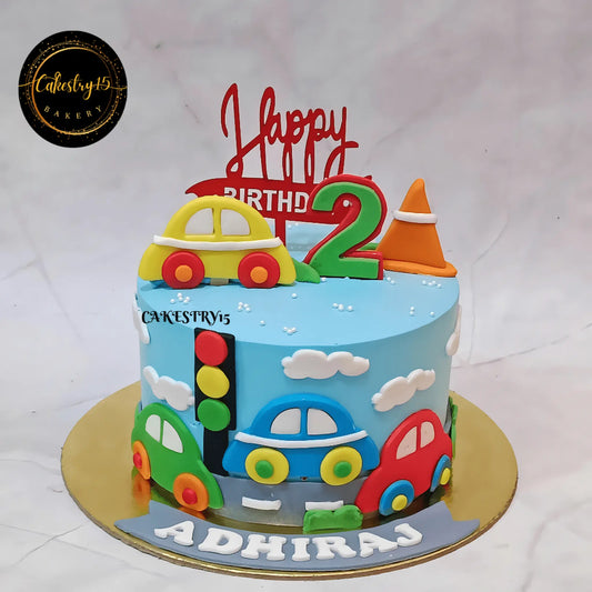 Car theme eggless butterscotch kids birthday cake for 2nd birthday by Cakestry15 Noida