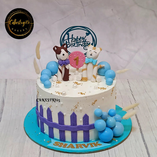 Eggless kids birthday cake with cat and dog theme design for first birthday celebrations, premium theme cake Noida.