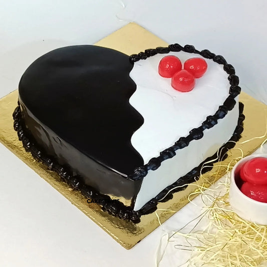 Heart-shaped 1kg choco vanilla cake with ganache and whipped cream from Cakestry15