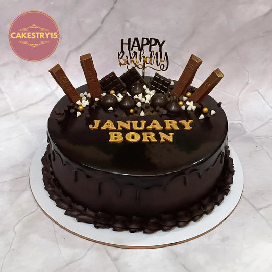 Rich chocolate kids birthday cake with chocolates, a premium theme cake Noida from eggless cakes collection