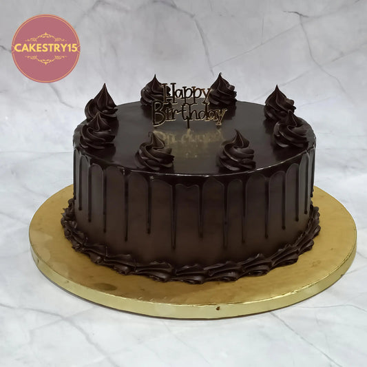 Classic chocolate truffle birthday cake style with drip and rosettes, theme cake Noida from eggless cakes collection