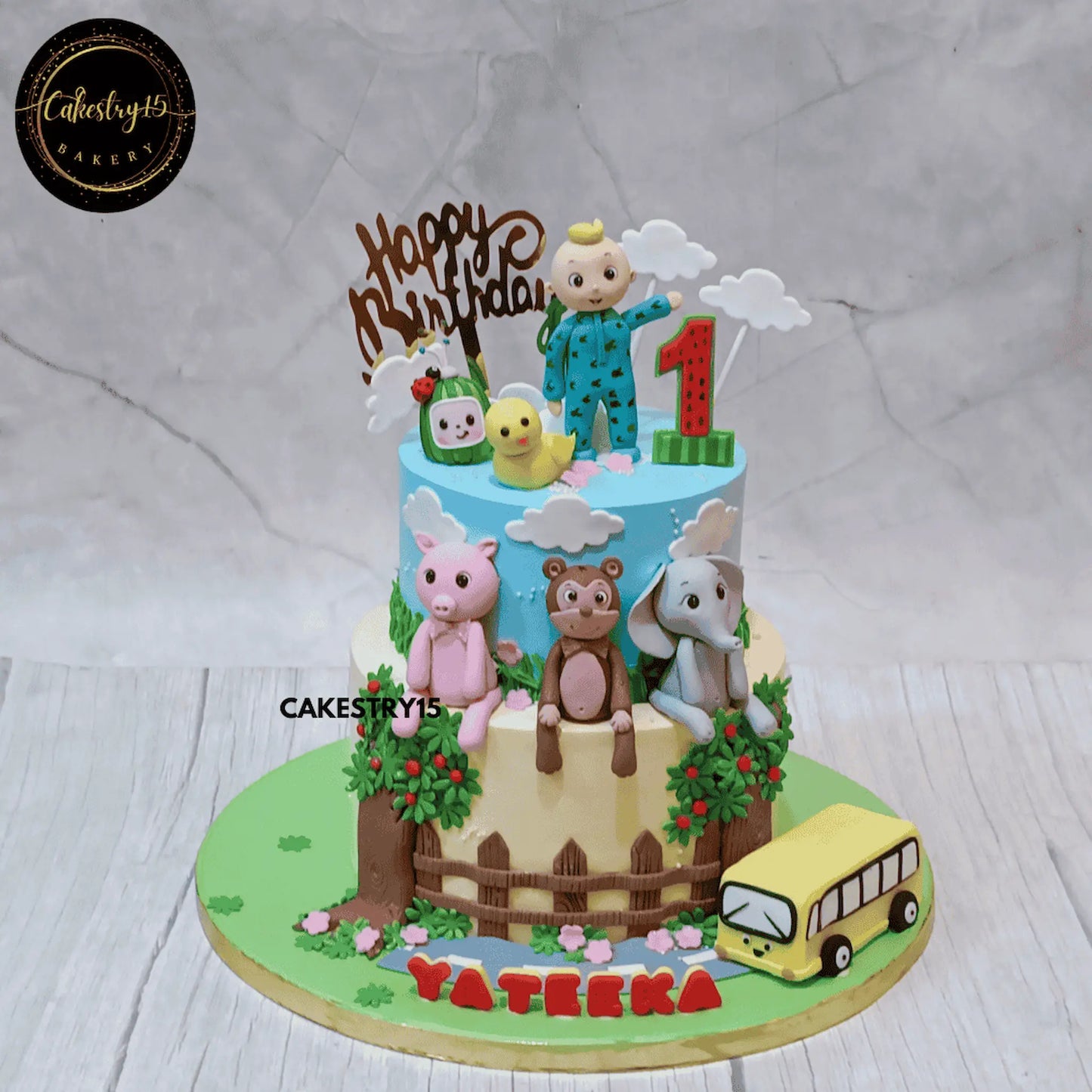 eglgless cocomelon 3kg chocolate first birthday cake for yateeka topped with fondant cocomelon and jungle characters by cakestry15 noida