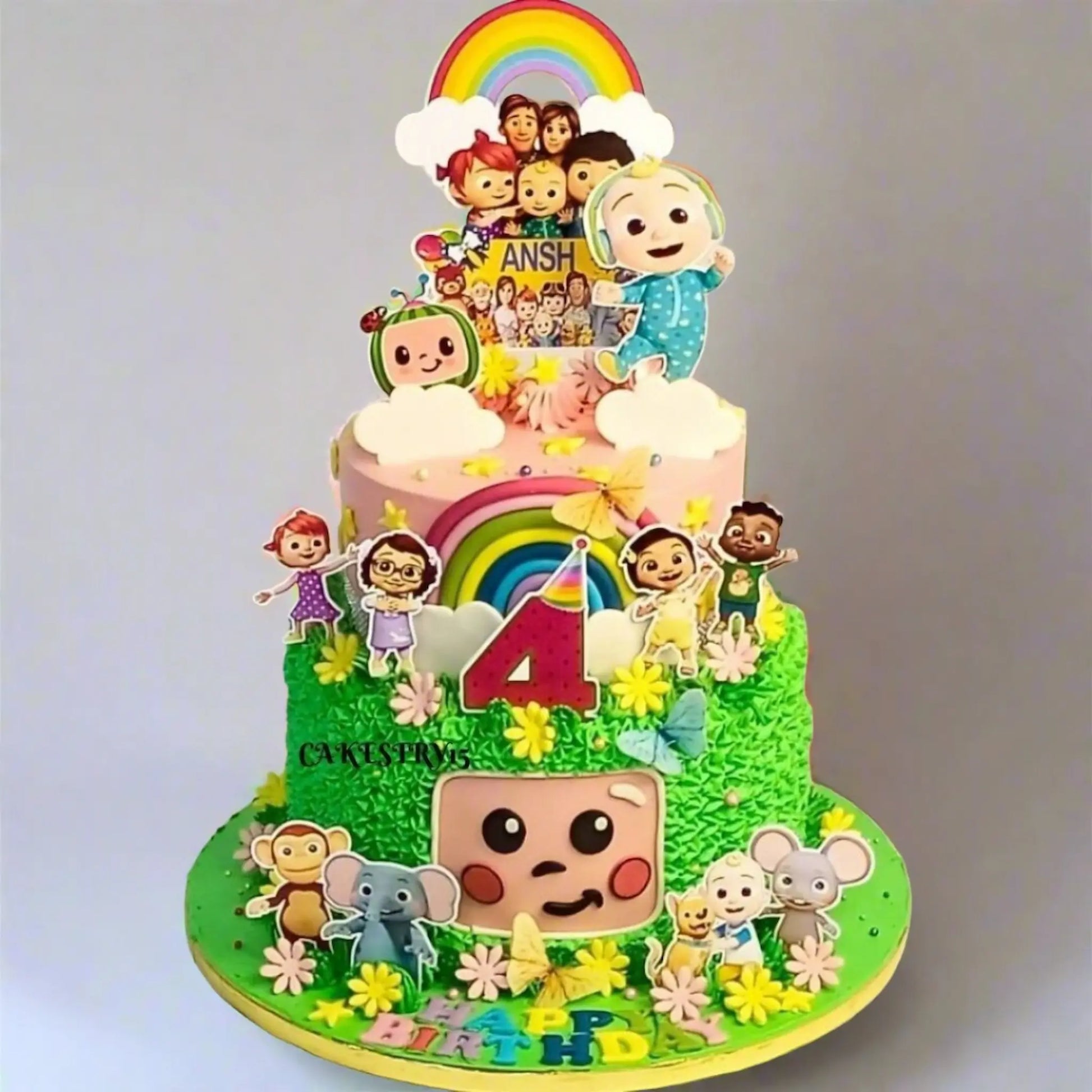 Cocomelon family theme kids birthday cake in Noida, 3kg eggless chocolate two tier cake with JJ and family characters for 4th birthday celebration