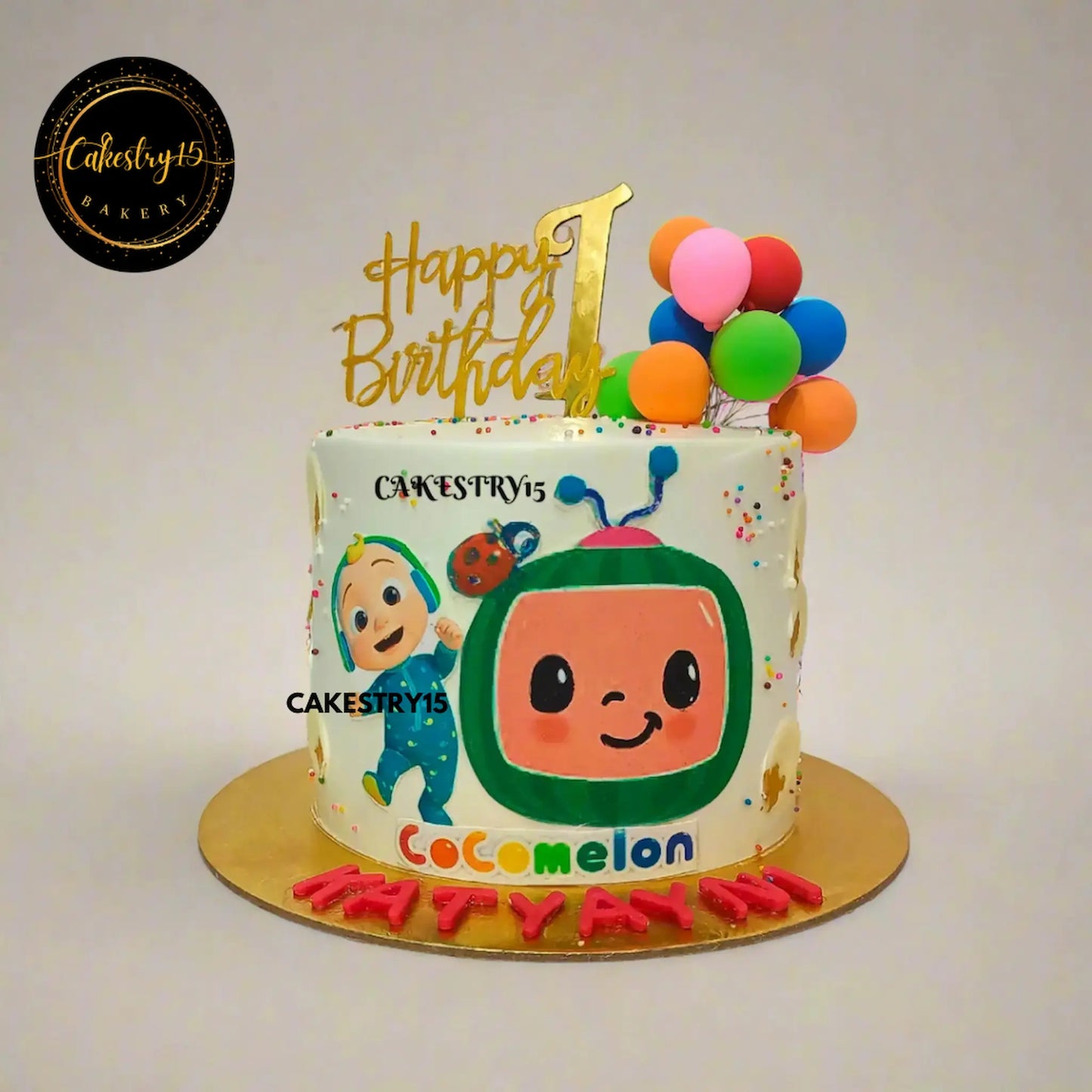 Cocomelon first birthday cake with JJ and balloons, eggless vanilla kids birthday cake in Noida for custom celebrations