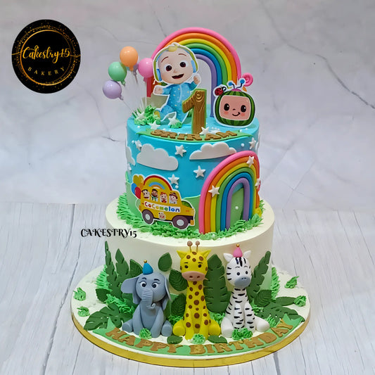 Eggless Cocomelon jungle kids birthday cake with animals, designed as a premium theme cake Noida for first birthday celebrations.