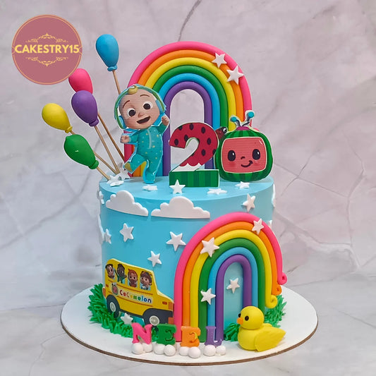 Cocomelon playtime kids birthday cake with TV, bus and duck details from an eggless cakes bakery offering a theme cake Noida.