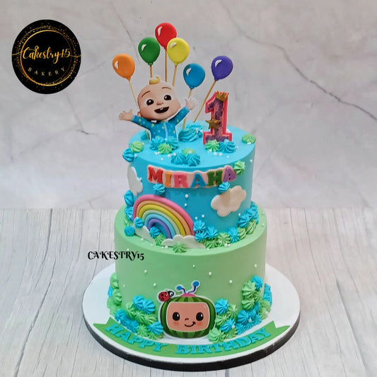 Cocomelon rainbow balloon first birthday cake eggless kids birthday cake in Noida with fondant decorations