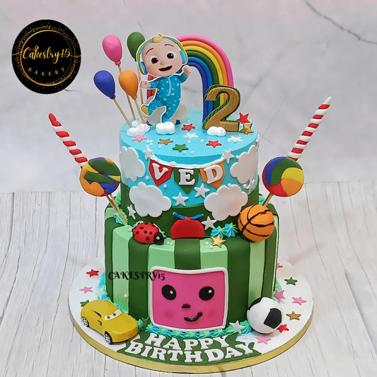 Cocomelon sports theme 2nd birthday cake for kids in Noida with football basketball and fondant decorations eggless custom cake