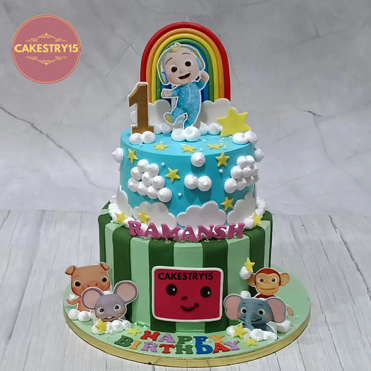Cocomelon theme first birthday eggless cake with animal characters and rainbow design by Cakestry15 in Noida