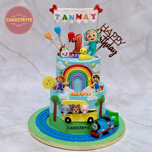 Cocomelon Thomas Train first birthday cake in choco vanilla eggless design for kids birthday celebration in Noida