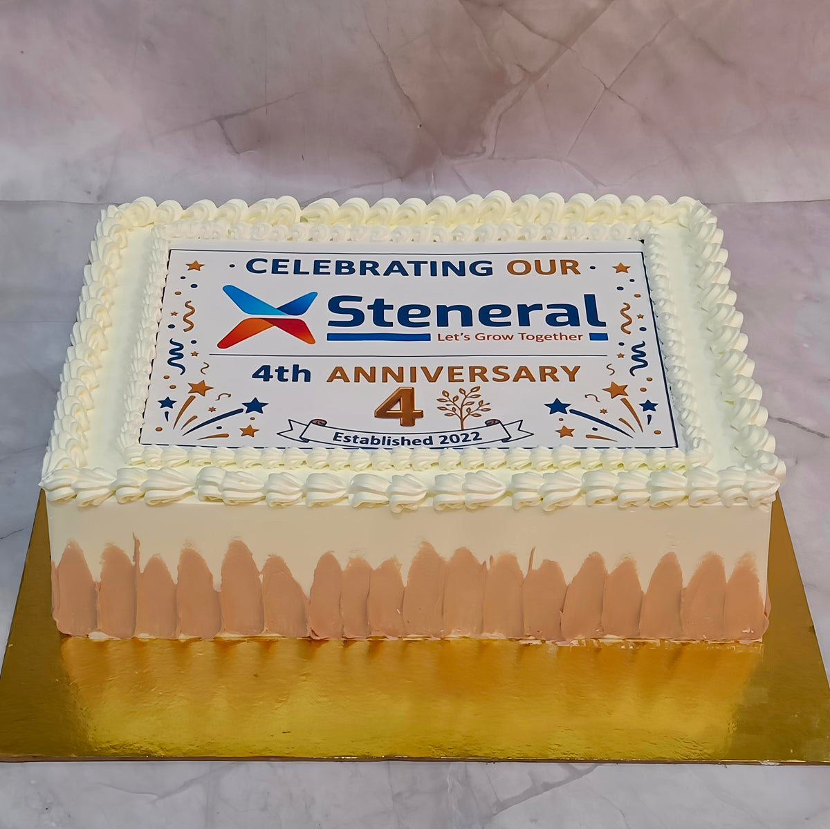 Premium eggless corporate anniversary photo cake with edible company logo print, rectangular pineapple cake for office celebrations, promotions, retirements and business events in Noida.