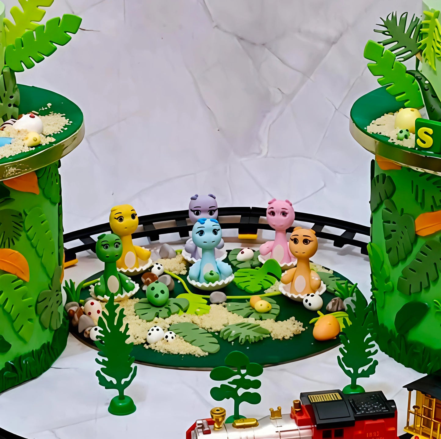 Dinosaur egg shell cake detail with dinosaurs emerging from eggs on a tray, part of a custom kids birthday cake in Noida.