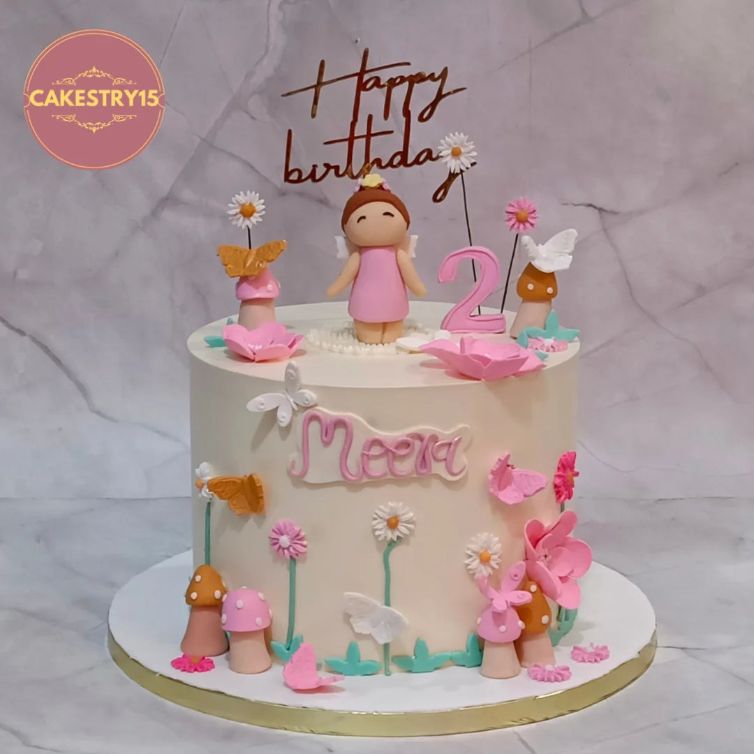 Doll Fairy theme kids birthday cake with butterflies and flowers, a theme cake Noida design from a premium eggless cakes bakery.