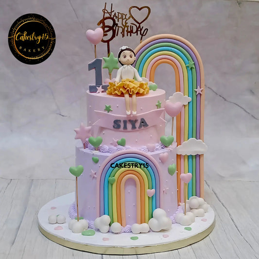 Beautiful kids birthday cake with doll theme cake Noida design, made as eggless cakes with rainbow and fondant details