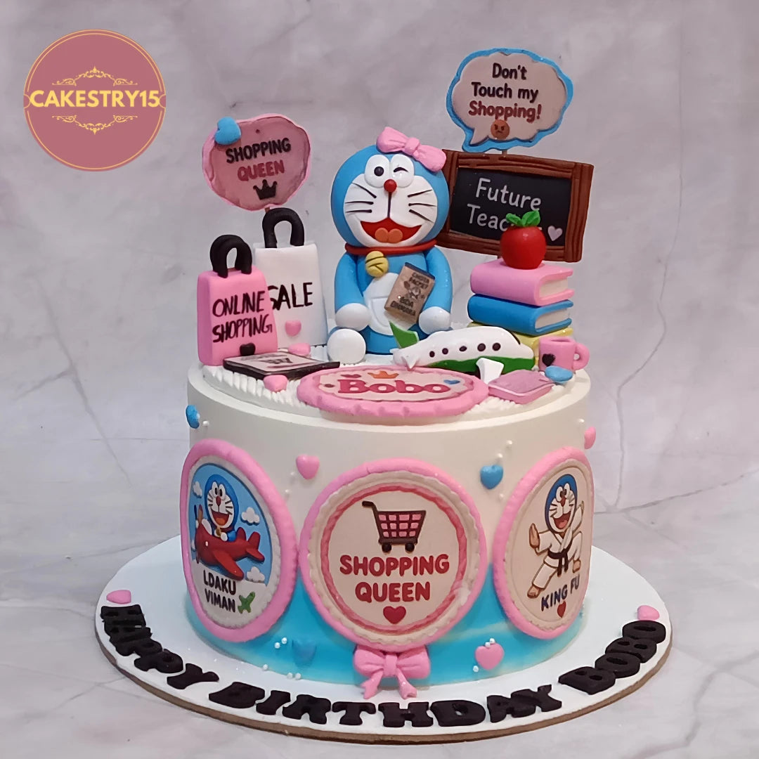 Doraemon kids birthday cake with travel and shopping theme details, a premium theme cake Noida design from our range of eggless cakes.