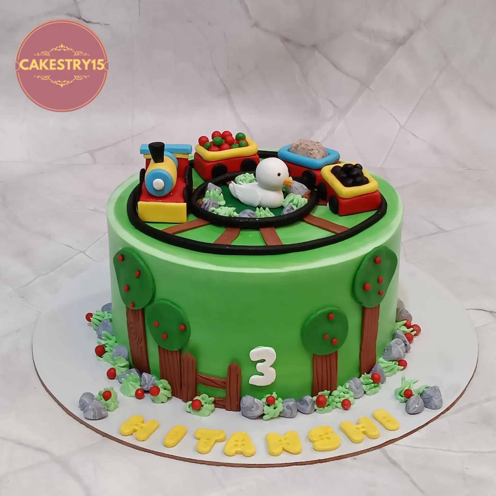 Eggless duck and train theme kids birthday cake in chocolate flavour for 3rd birthday celebrations in Noida by cakestry15