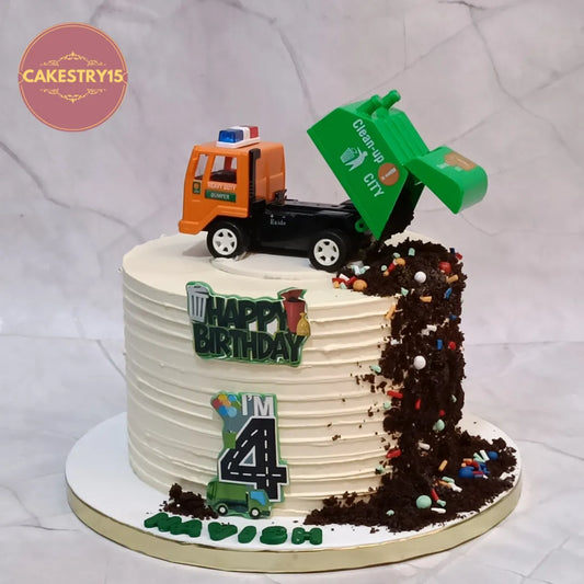 Eggless dumper kids birthday cake with construction theme detailing and chocolate design for theme cake Noida celebrations.