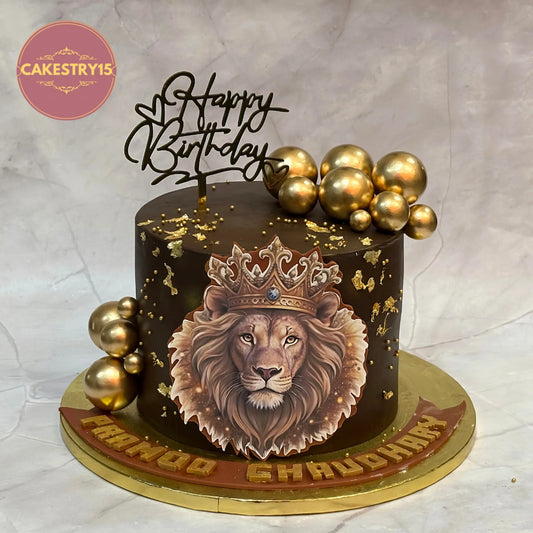 Boss theme eggless chocolate birthday cake with lion edible print and gold accents by Cakestry15 in Noida