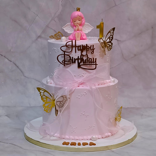 Fairy theme kids birthday cake with butterflies and pink ribbon, a theme cake Noida option from our eggless cakes collection.