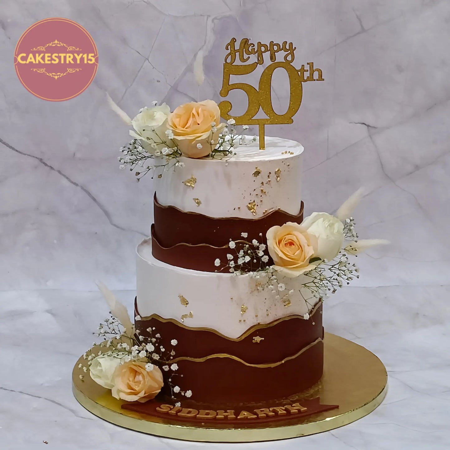 Elegant floral kids birthday cake as a theme cake Noida design made with eggless cakes featuring fresh roses and fault line styling