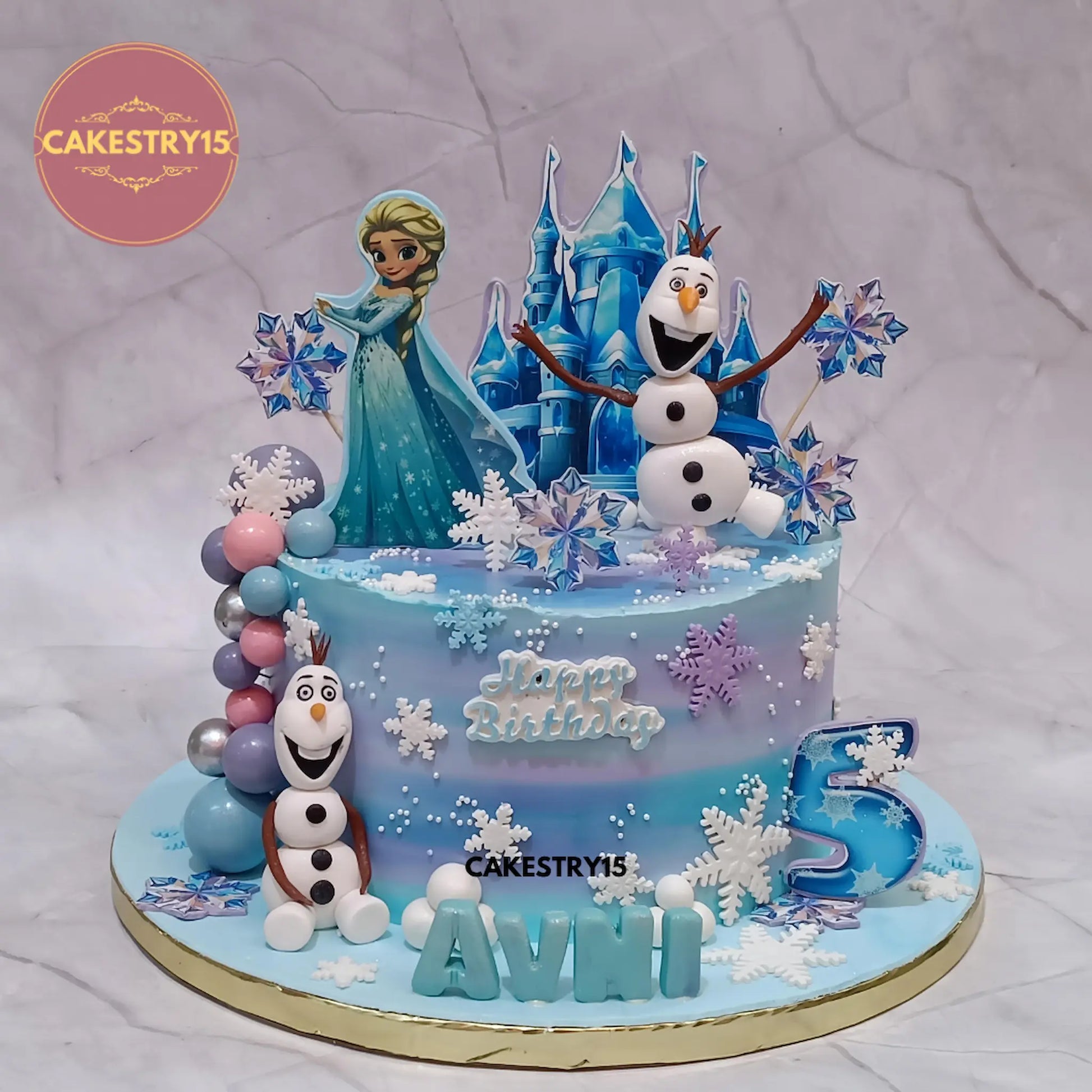 Frozen theme eggless kids birthday cake with Elsa and Olaf in truffle flavour from Cakestry15 Noida