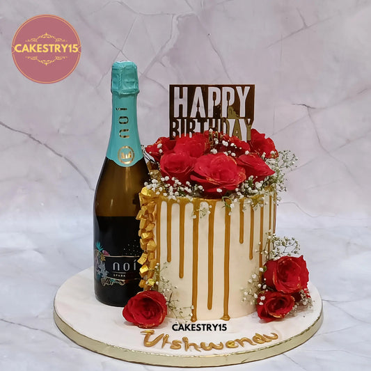 2.5kg chocolate wine theme birthday cake with white ganache, red roses, and golden accents from Cakestry15