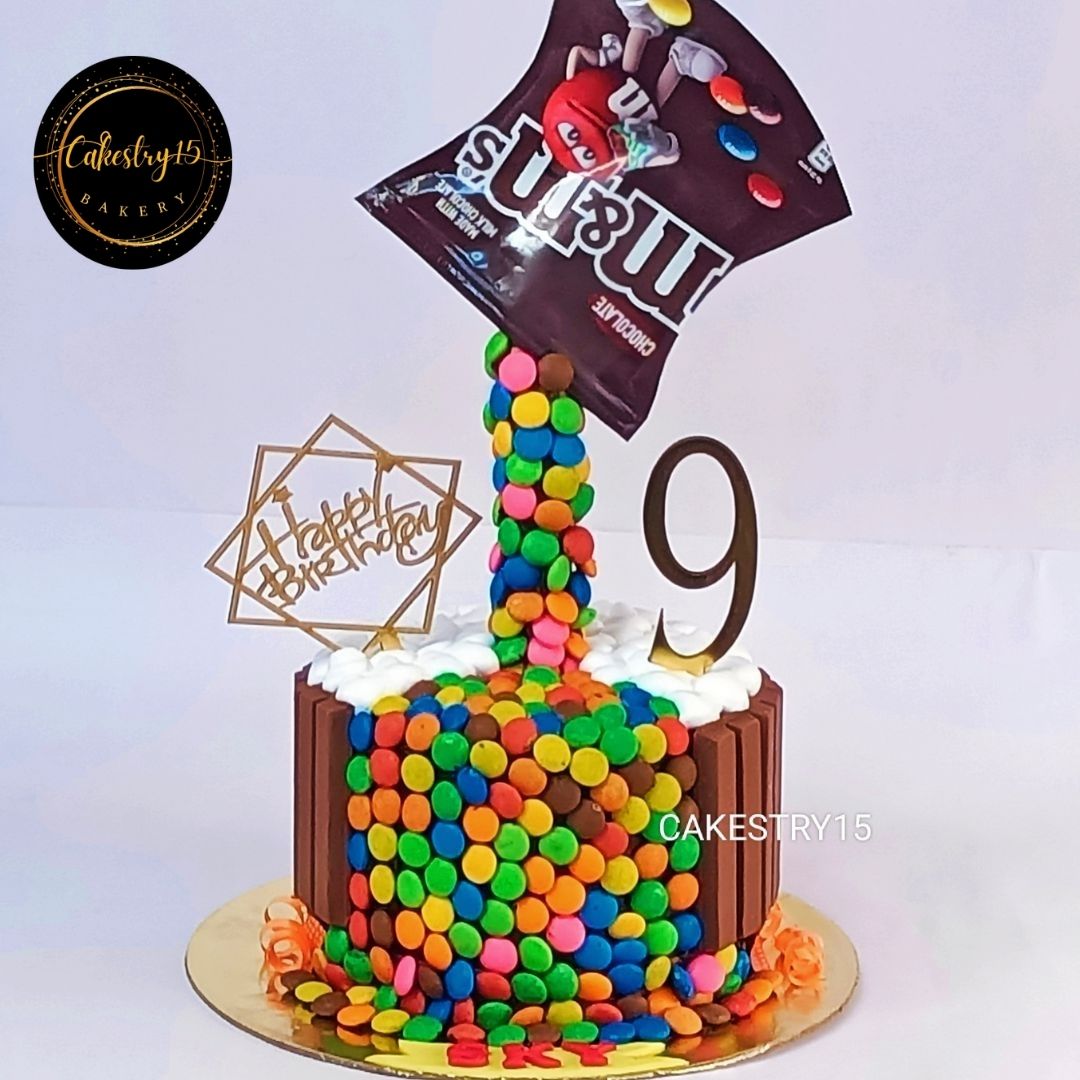gravity M&M Theme 2kg chocolate birthday Cake by cakestry15,noida,cake full image