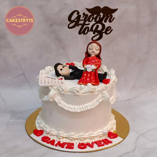 Premium groom to be celebration cake handcrafted as a custom theme cake Noida with rich eggless chocolate truffle flavour and personalised edible calendar.