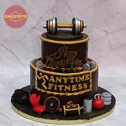 Gym theme anniversary cake with dumbbells, weights and boxing gloves in chocolate eggless design Noida