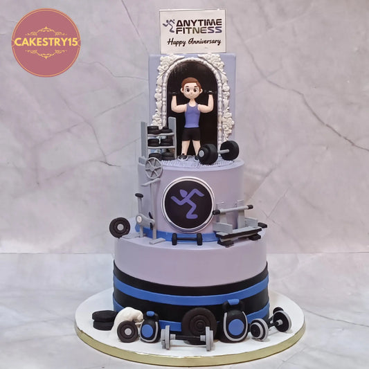 Eggless gym theme anniversary cake with weights, dumbbells, exercise topper and custom logo for corporate celebration in Noida