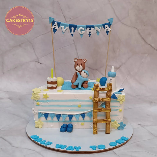 Half birthday teddy baby fondant cake eggless kids birthday cake in Noida with milk bottle shoes and banner