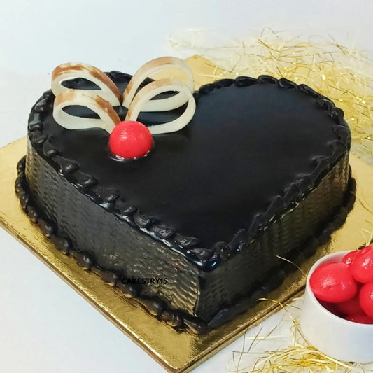 Heart-shaped 1kg chocolate truffle cake with chocolate accents from Cakestry15