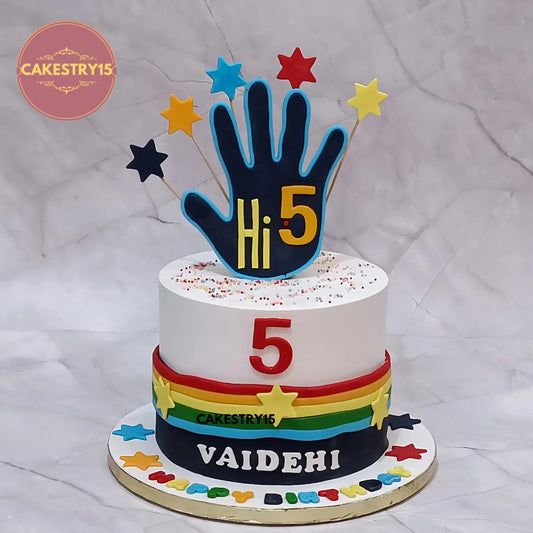 Eggless Hi5 kids birthday cake with colourful fondant strips and stars, premium theme cake Noida for birthday celebrations.
