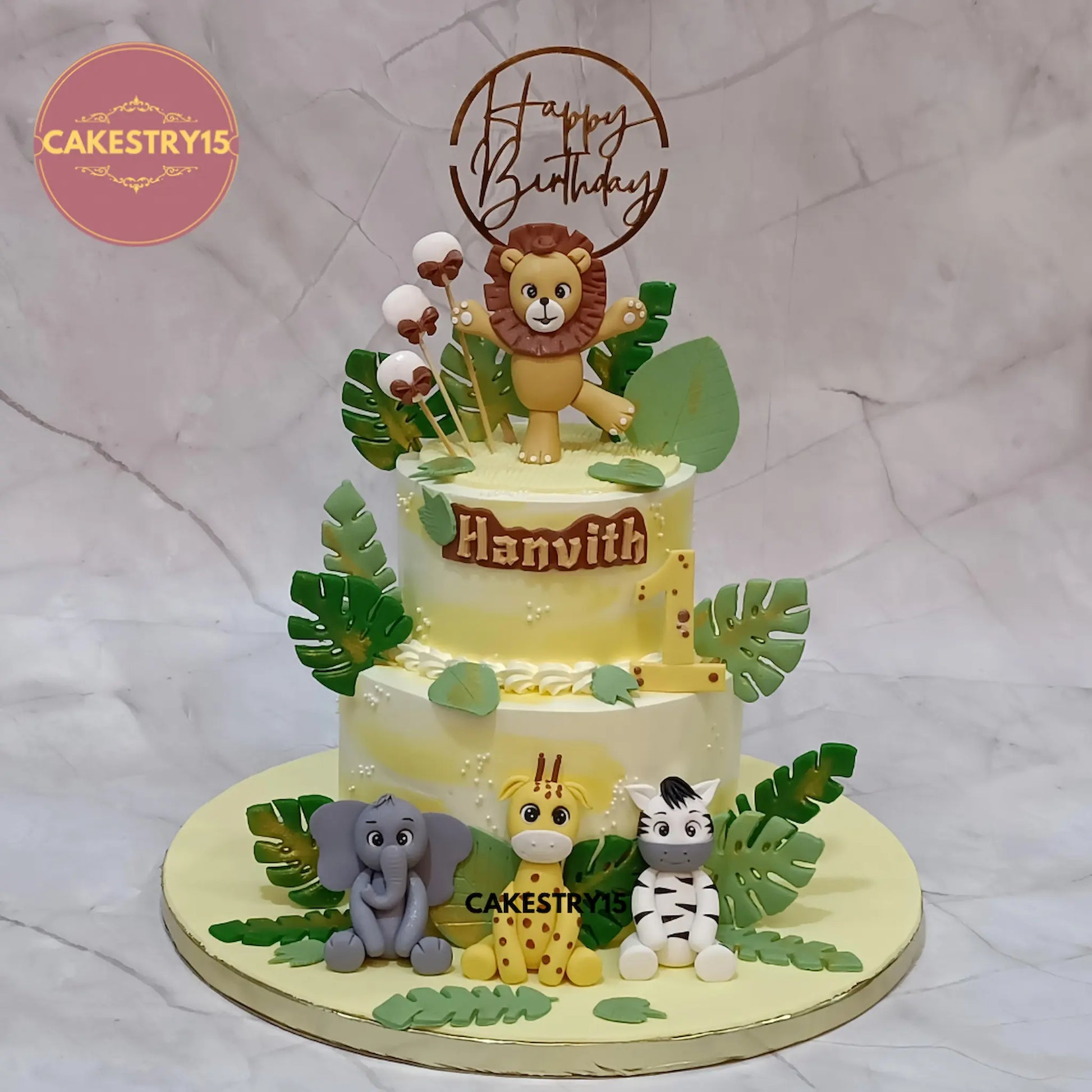 Jungle kids birthday cake with fondant animals and balloons, premium theme cake Noida for eggless cakes celebrations.
