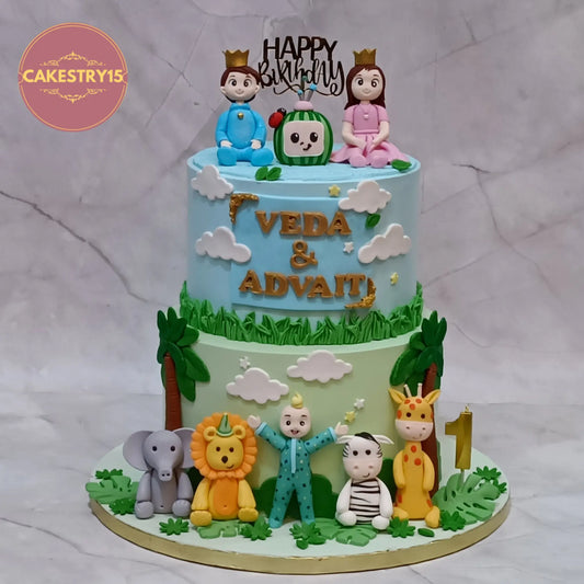 Jungle & Cocomelon twin first birthday cake with animals and TV theme, eggless choco vanilla custom kids cake in Noida for Veda and Advait
