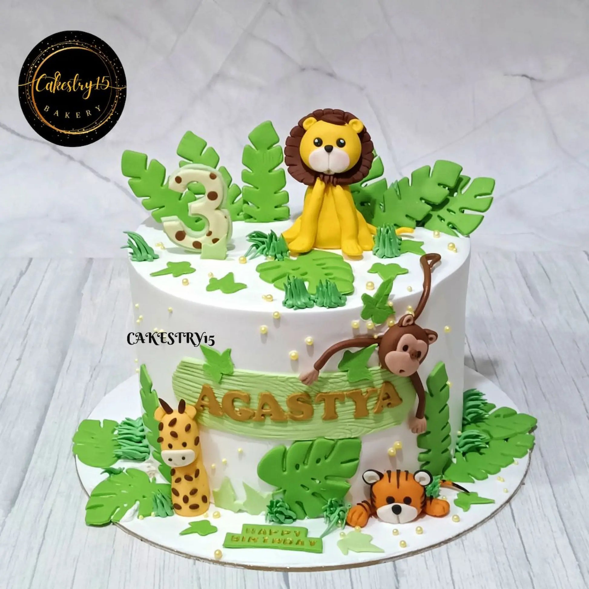 Premium jungle expedition kids birthday cake with fondant animals, theme cake Noida, and handcrafted eggless cakes for celebrations.