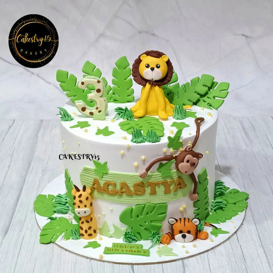Premium jungle expedition kids birthday cake with fondant animals, theme cake Noida, and handcrafted eggless cakes for celebrations.