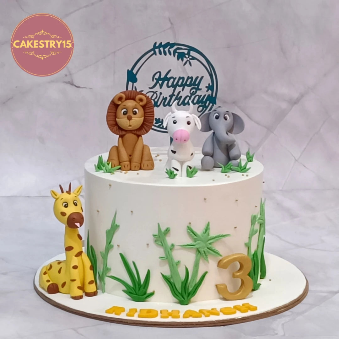 Eggless jungle explorers kids birthday cake featuring fondant animal figurines, a premium theme cake Noida families choose for special celebrations.