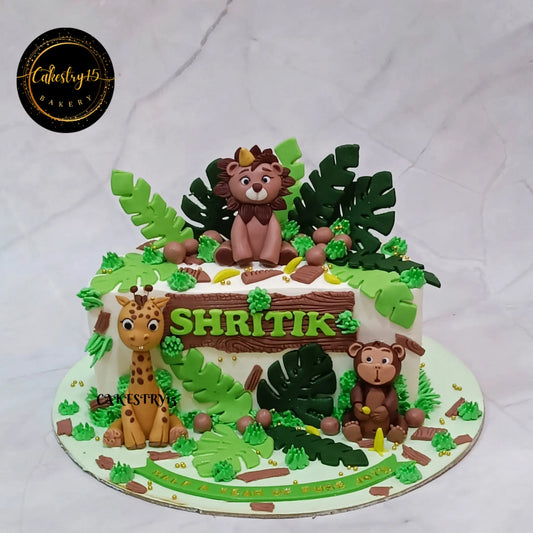 Jungle Joyride kids birthday cake with fondant animals, premium theme cake Noida from Cakestry15 featuring eggless cakes design.
